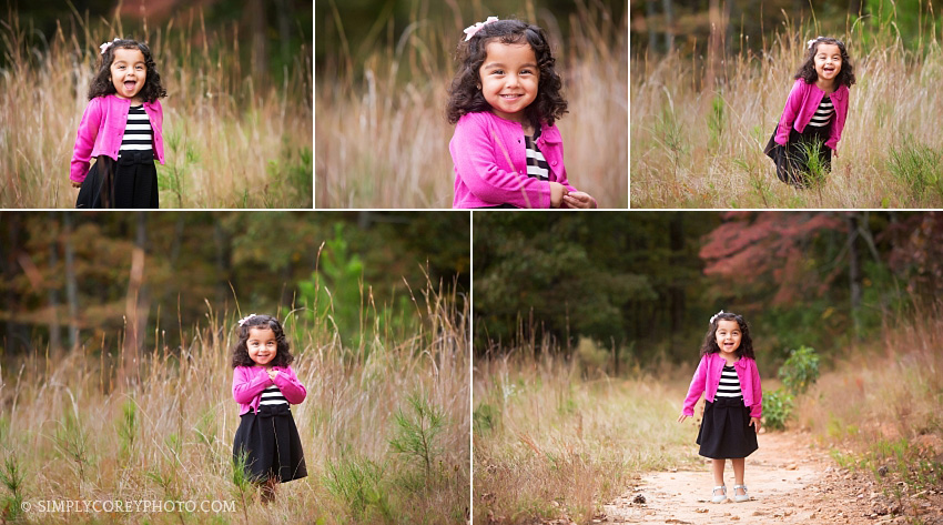 toddler in tall grass during an outdoor photography session by Atlanta baby photographer