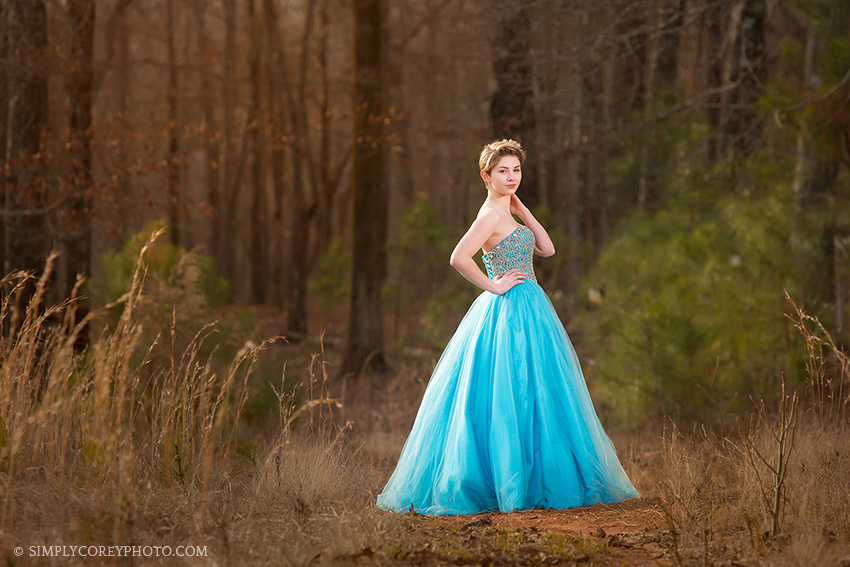 teen in a blue pageant dress by Douglasville prom photographer