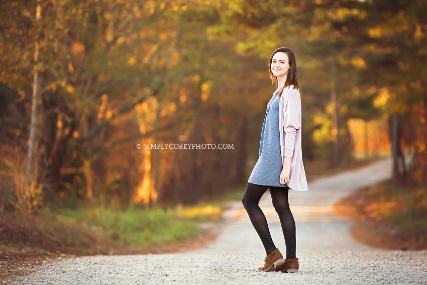 teen girl during an outdoor photo session by Atlanta senior portrait photographer
