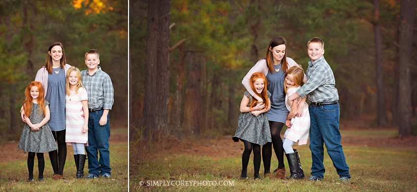 group of four siblings during an outdoor photography session by Atlanta family photographer