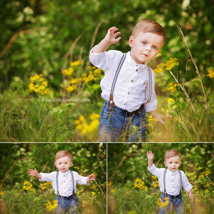 baby photographer Douglasville, toddler boy in suspenders dancing outside
