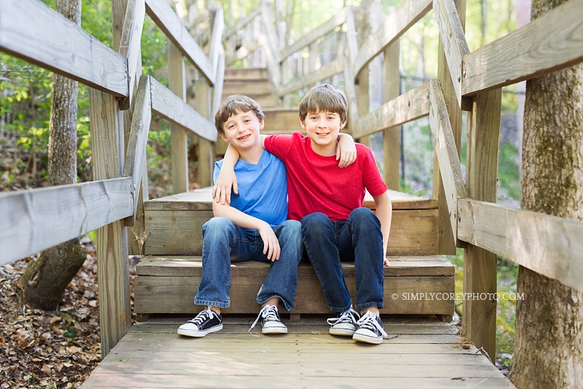 brothers on steps by Douglasville family photographer