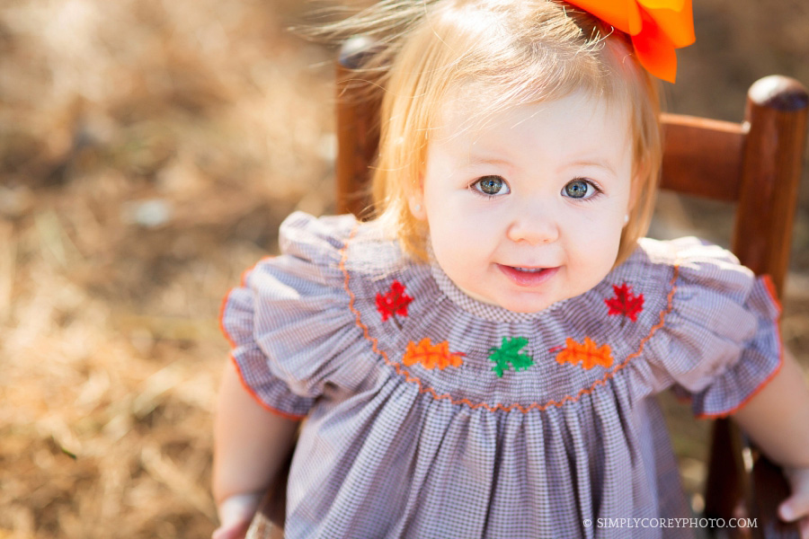 baby girl in a smocked dress by Atlanta toddler photographer