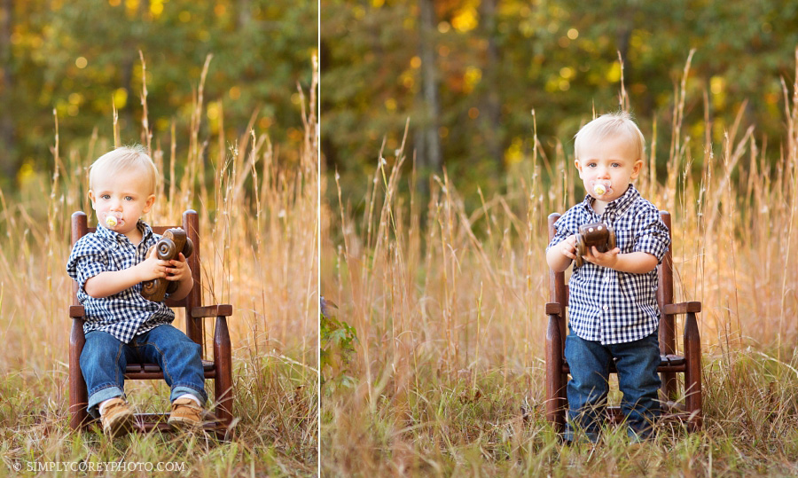 toddler in a field by Carrollton baby photographer