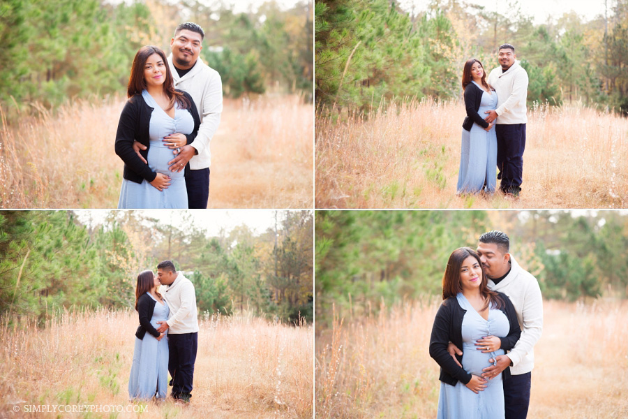 mom and dad in a field by Carrollton maternity photographer