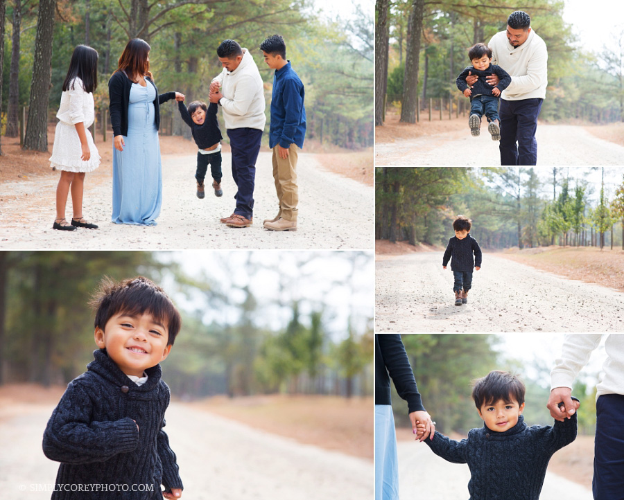 toddler boy with family on a dirt road by Atlanta child photographer