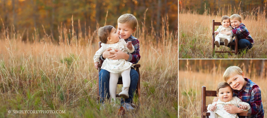 brother and sister in a field by Carrollton family photographer