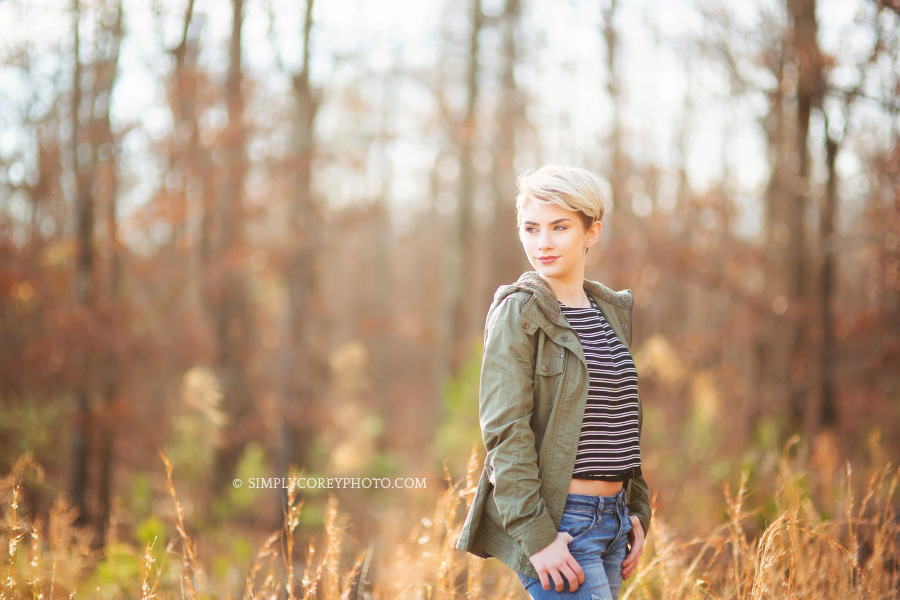 teenage girl model in a field by Atlanta teen photographer