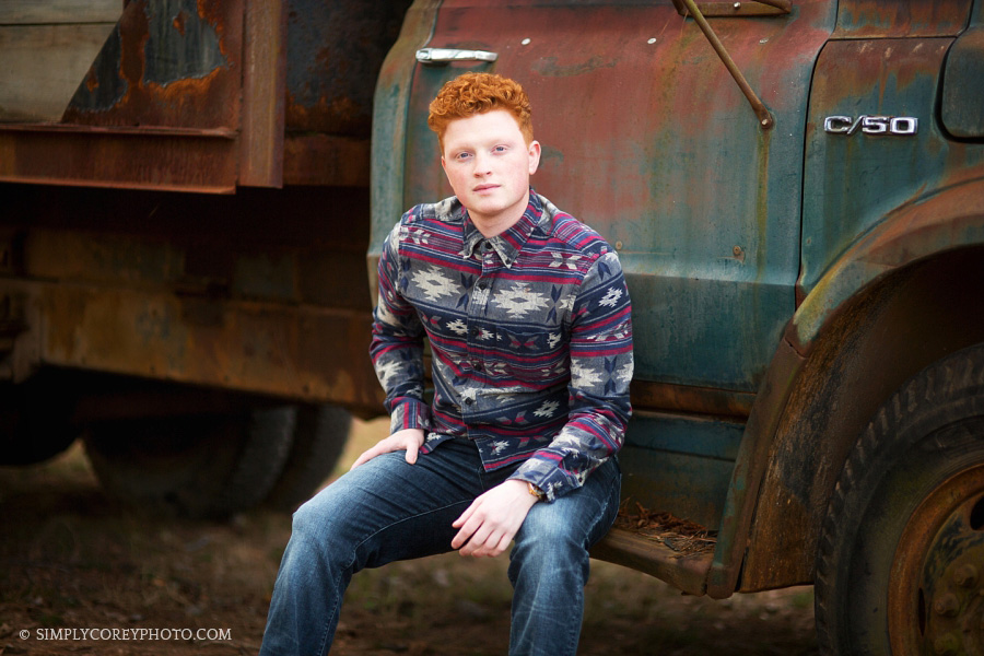 teen boy with vintage truck by Atlanta senior portrait photographer