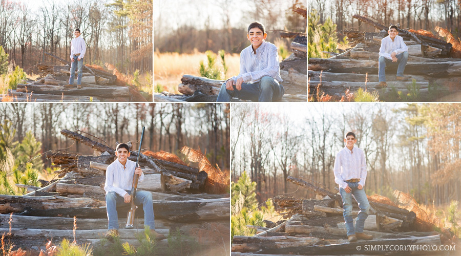 boy on a pile of logs by Carrollton senior portrait photographer