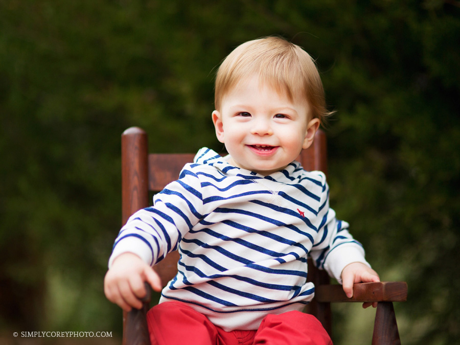 Atlanta baby photography of a one year old boy in a rocking chair
