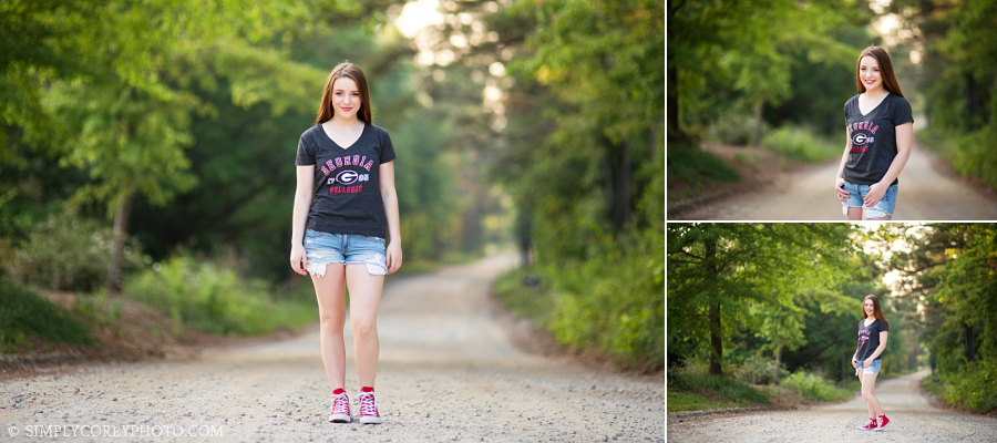 Atlanta senior portrait photography of a girl in a UGA shirt on a dirt road