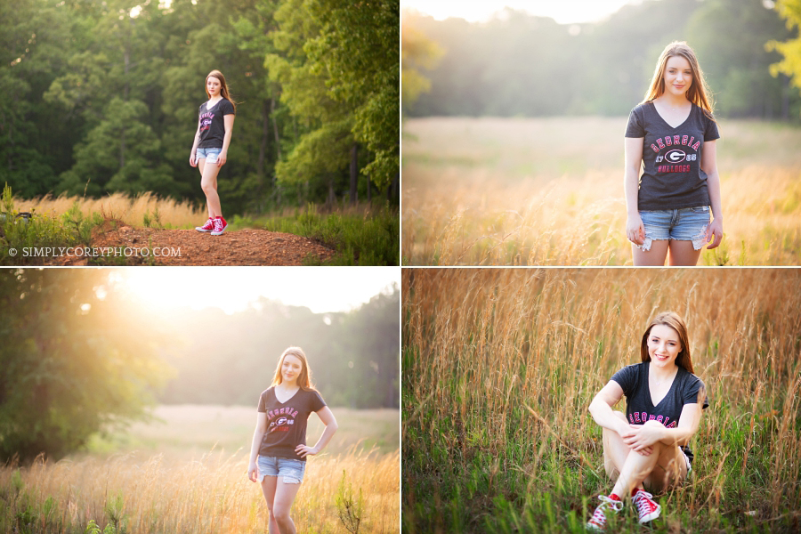 Carrollton senior portraits of a girl in a UGA shirt outside in a field