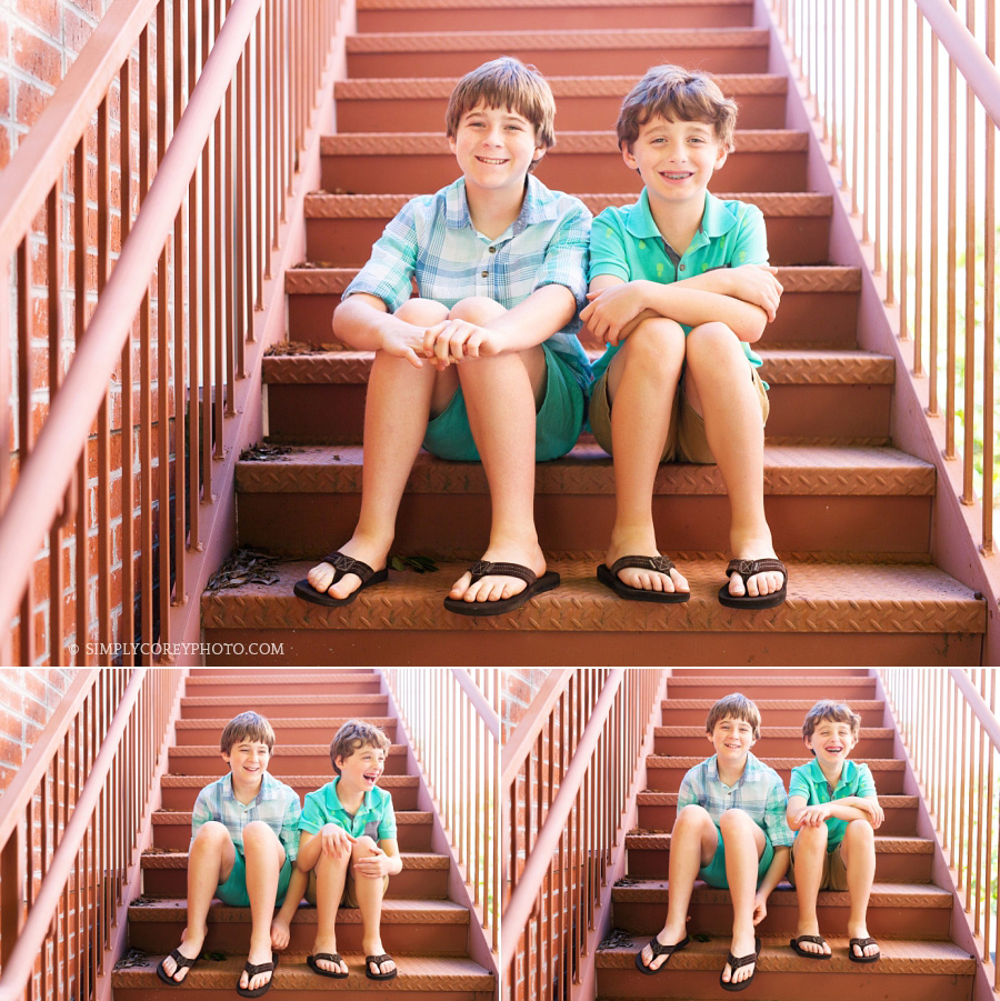 brothers sitting on steps downtown by Carrollton family photographer