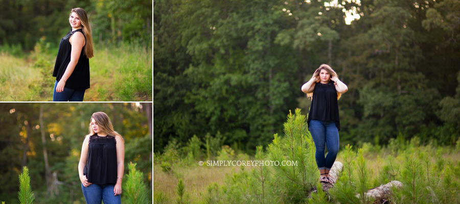 Douglasville senior portraits in a field with pine trees