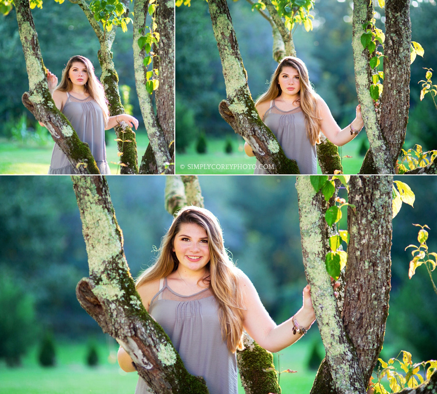 teen girl with tree branches by Villa Rica senior portrait photographer
