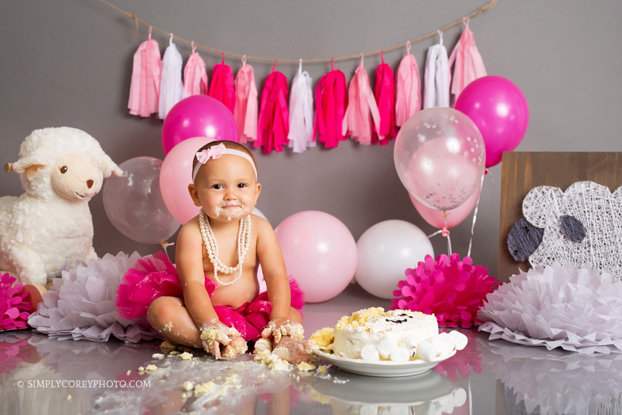 Atlanta cake smash photography of baby girl in pink tutu with lamb cake