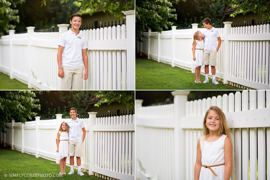 brother and sister near a white fence by Douglasville family photographer