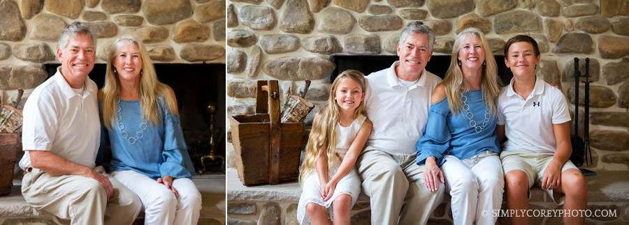 family in front of a fireplace by Villa Rica family photographer