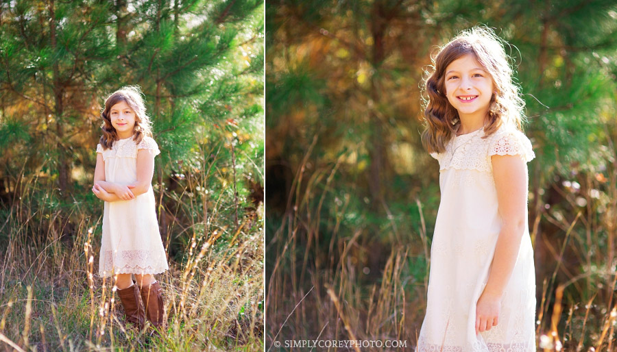 portraits of a girl near pine trees by Douglasville children's photographer
