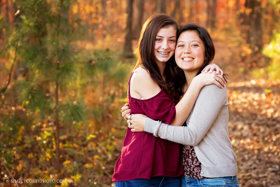 outdoor fall portrait of sisters by Newnan teen photographer