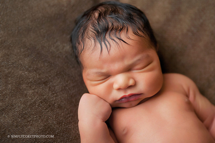 baby boy on brown blanket by Douglasville newborn photographer