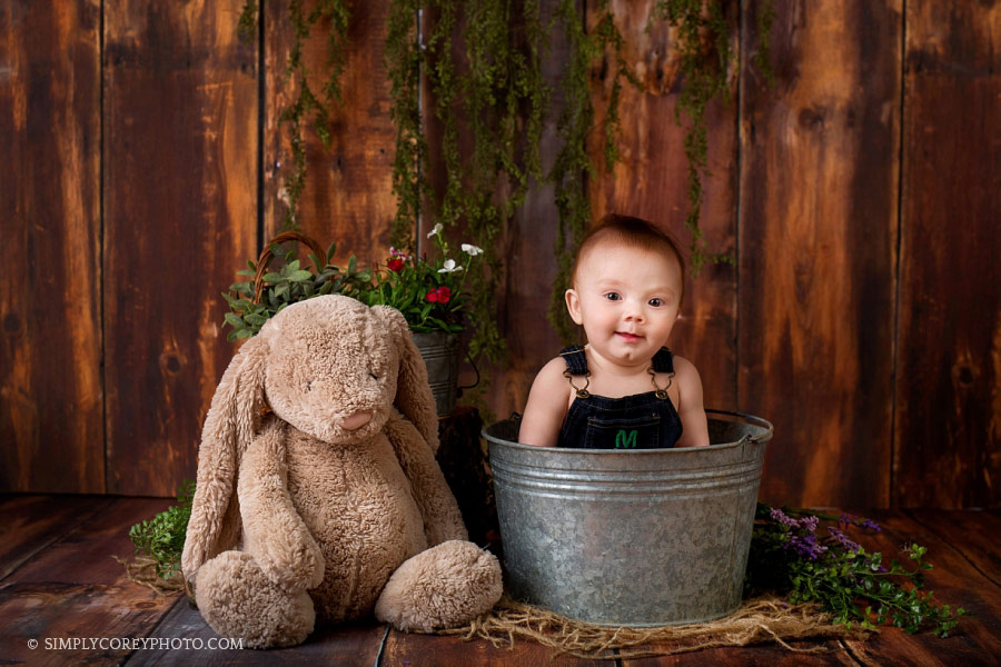 baby photographer Carrollton, Georgia; boy in a bucket with a bunny