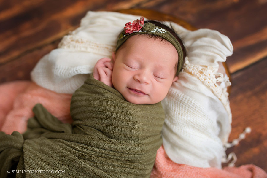 newborn photographer Carrollton, Georgia, baby girl with pink and green