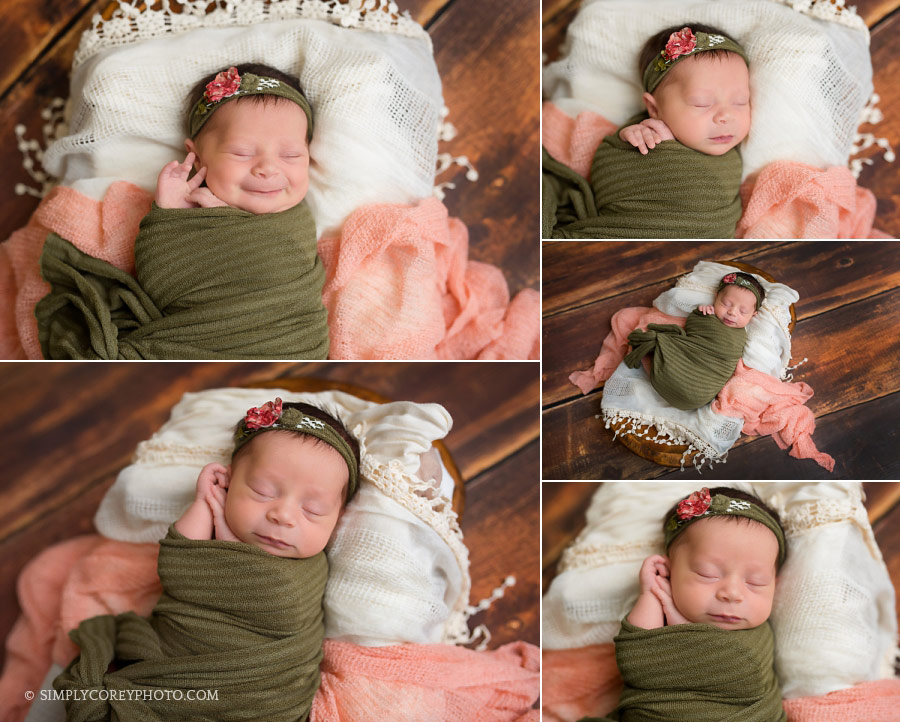newborn photographer Newnan, smiling baby girl with pink and green