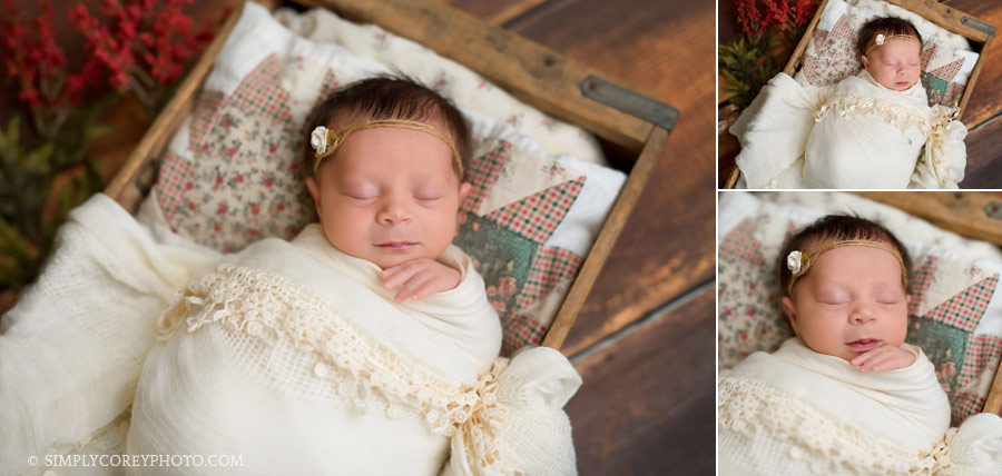 Villa Rica newborn photographer, baby girl in a wood crate with a quilt