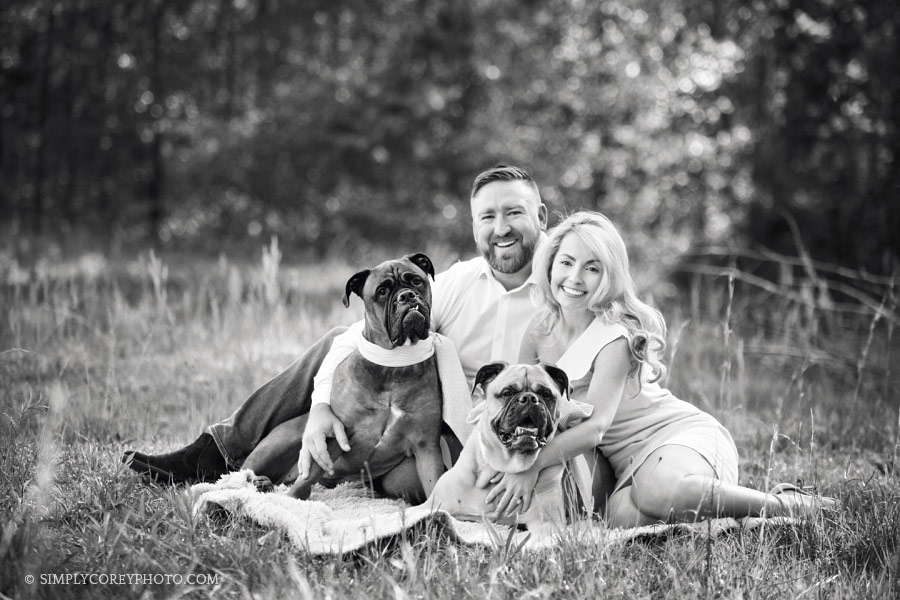 Carrollton, Georgia family photographer, couple outside with dogs