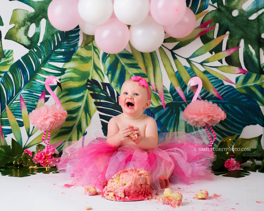 cake smash photographer near Atlanta, baby girl in a pink tutu with a flamingo theme
