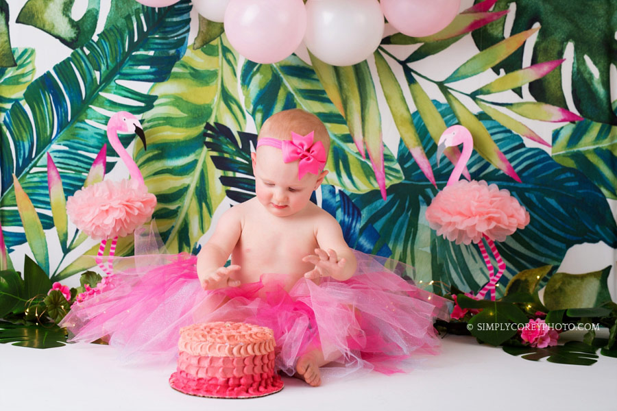 Villa Rica cake smash photographer, girl in a pink tutu with a tropical flamingo theme