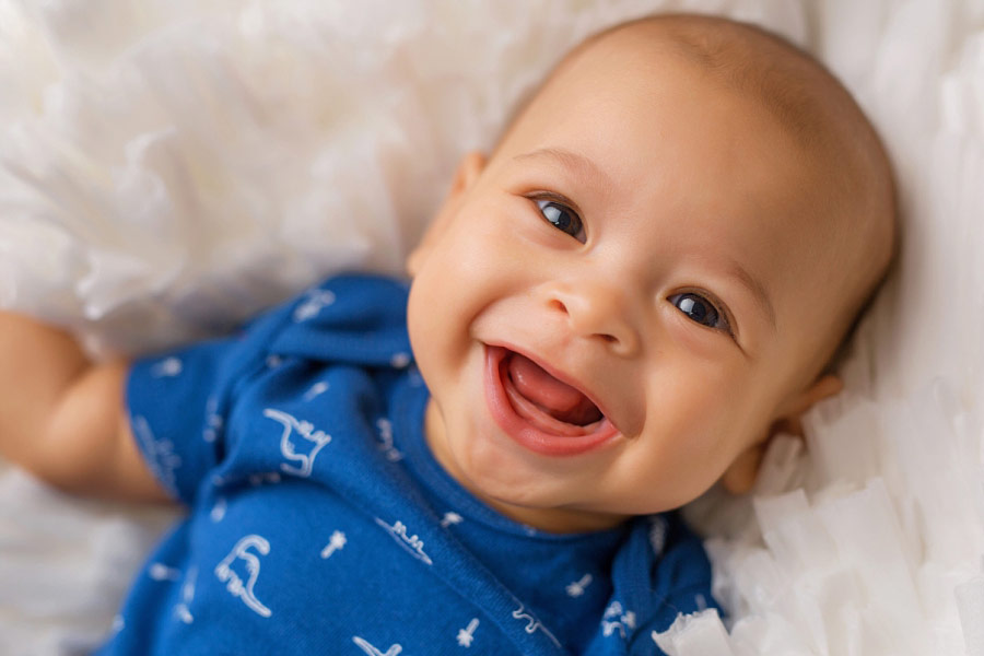 Douglasville baby photographer, 4 month old boy smiling in studio