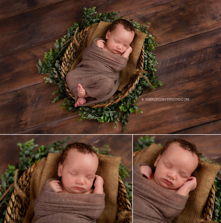 Newnan newborn photographer, baby in a basket with burlap and greenery