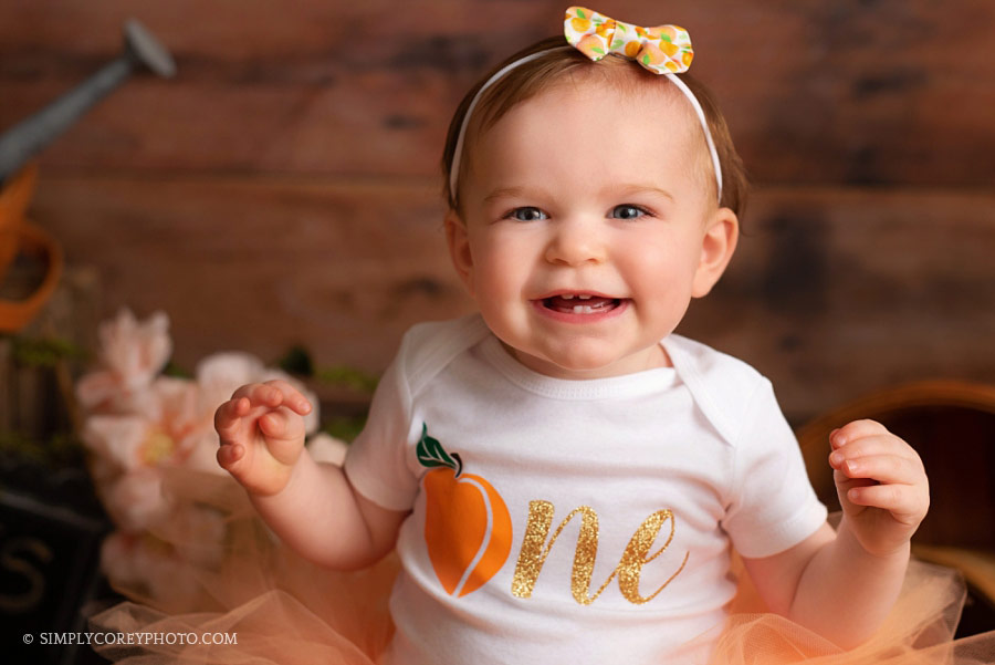 baby photographer near Carrollton, GA peach one year session