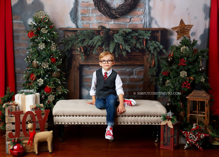Atlanta Christmas Mini Session with a boy in glasses in studio