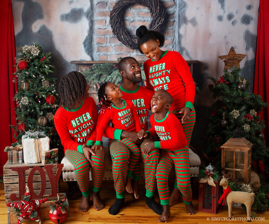 Newnan holiday mini session, family laughing in Christmas pajamas