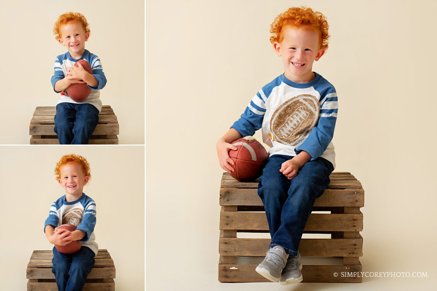 children's photographer Carrollton, Georgia; redhead boy with a football