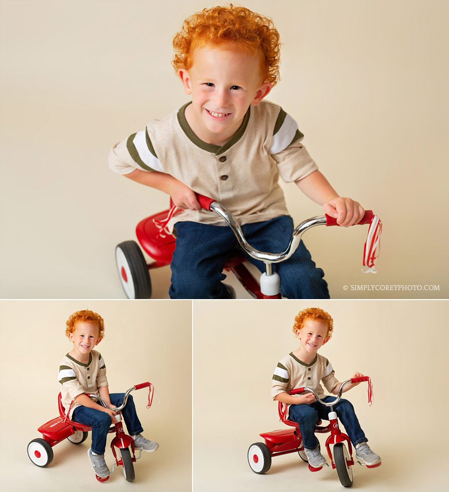 Newnan children's photographer, redhead boy on a tricycle