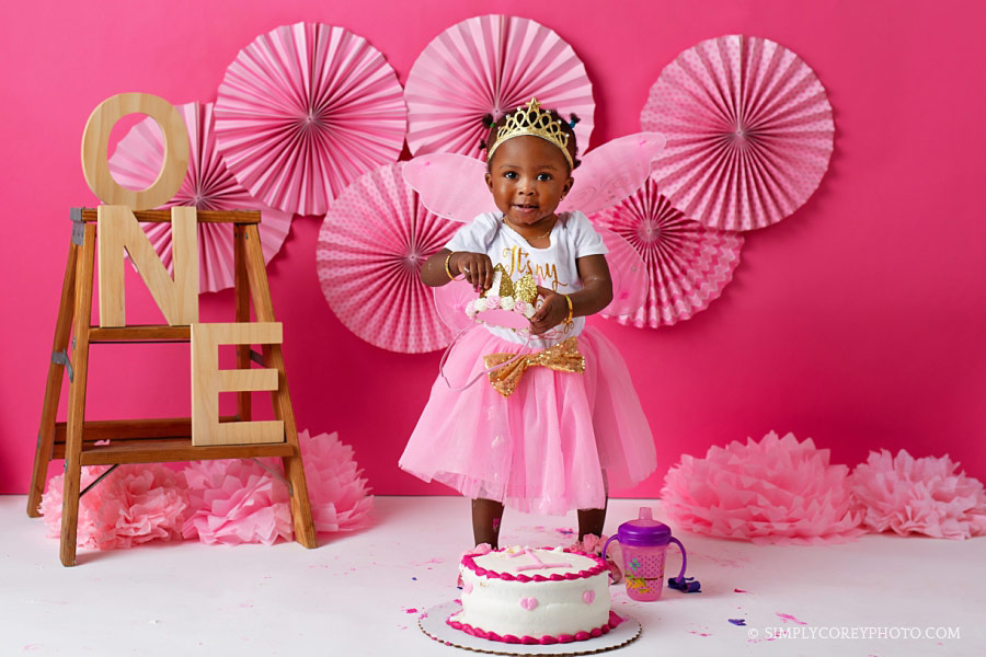 Villa Rica cake smash photographer, baby girl in a pink tutu and crown