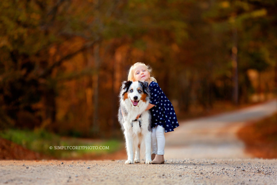 Atlanta pet photographer, fall portrait of a child and her Australian Shepherd