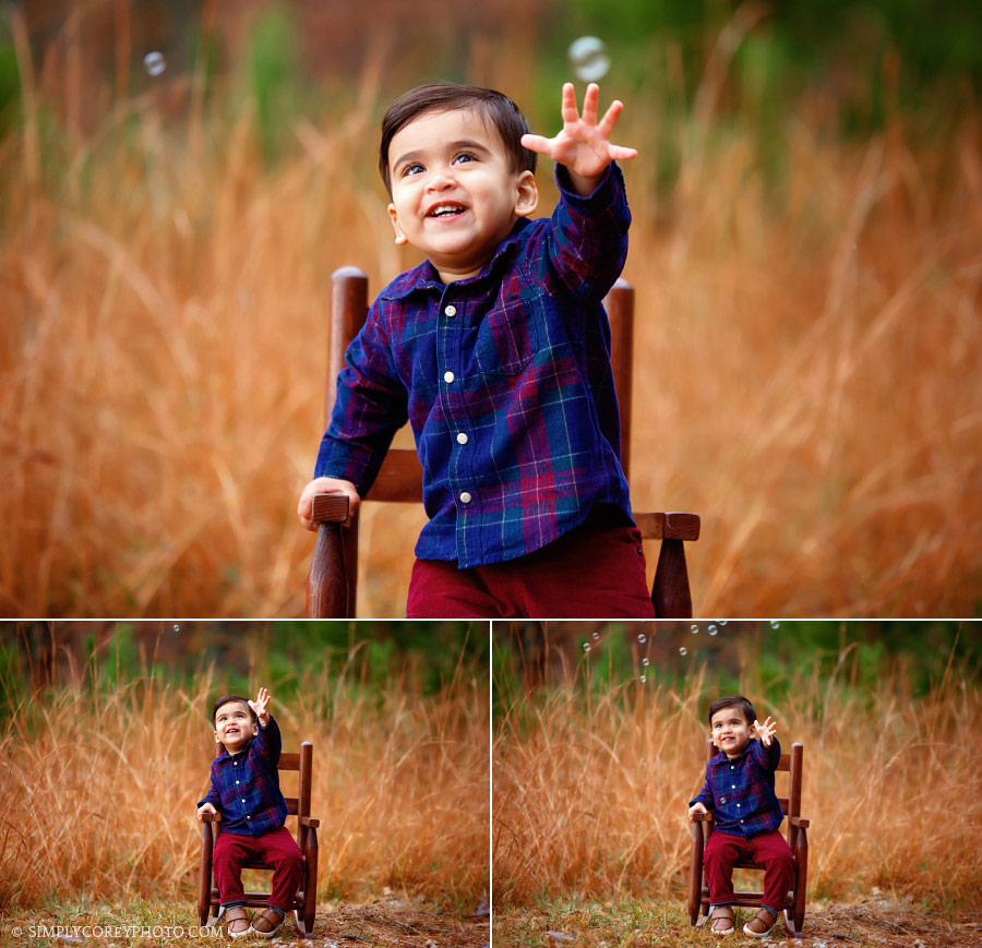 Atlanta baby photographer, toddler catching bubbles outside