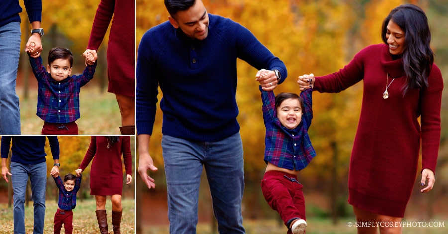 family photographer Atlanta, parents swinging toddler in the fall