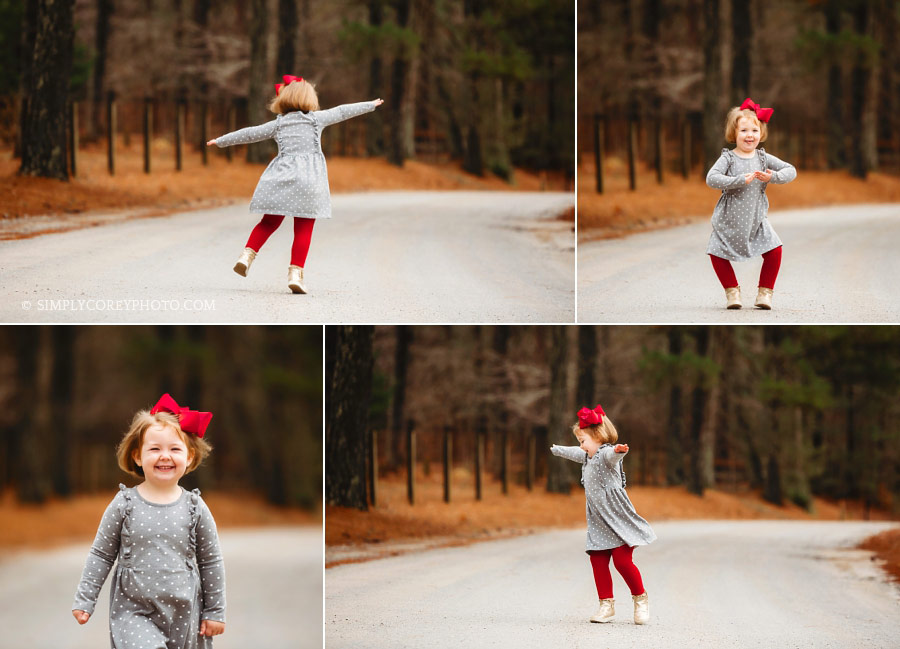 Villa Rica kids photographer, child dancing outside on country road