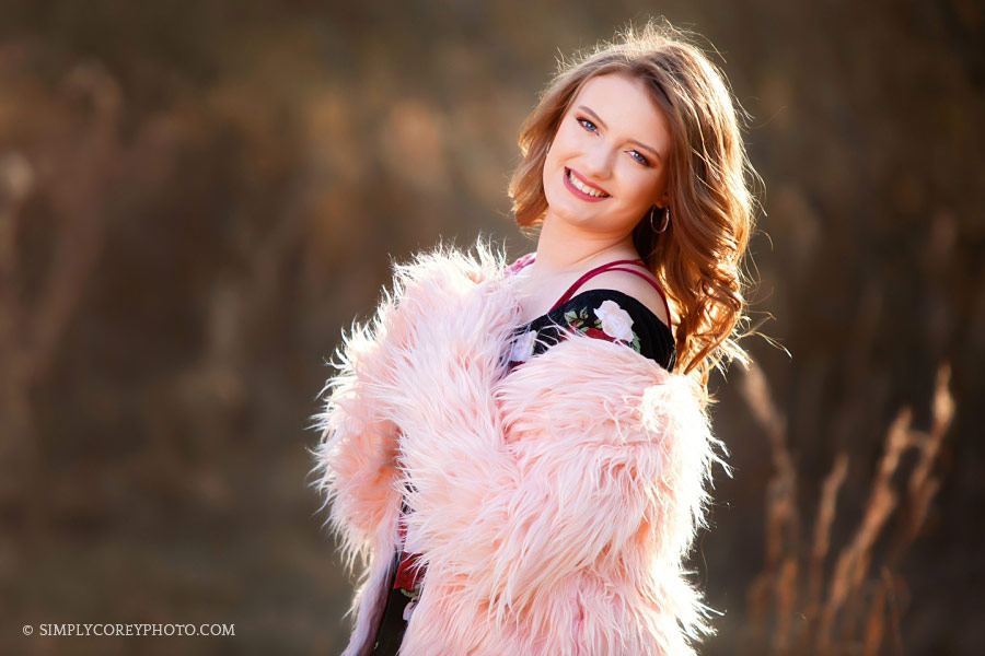 senior portraits near Newnan; teen girl in pink fur jacket