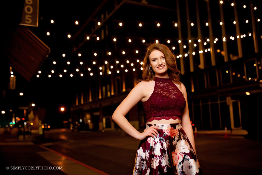 senior portraits in West Georgia, teen outside at night with string lights