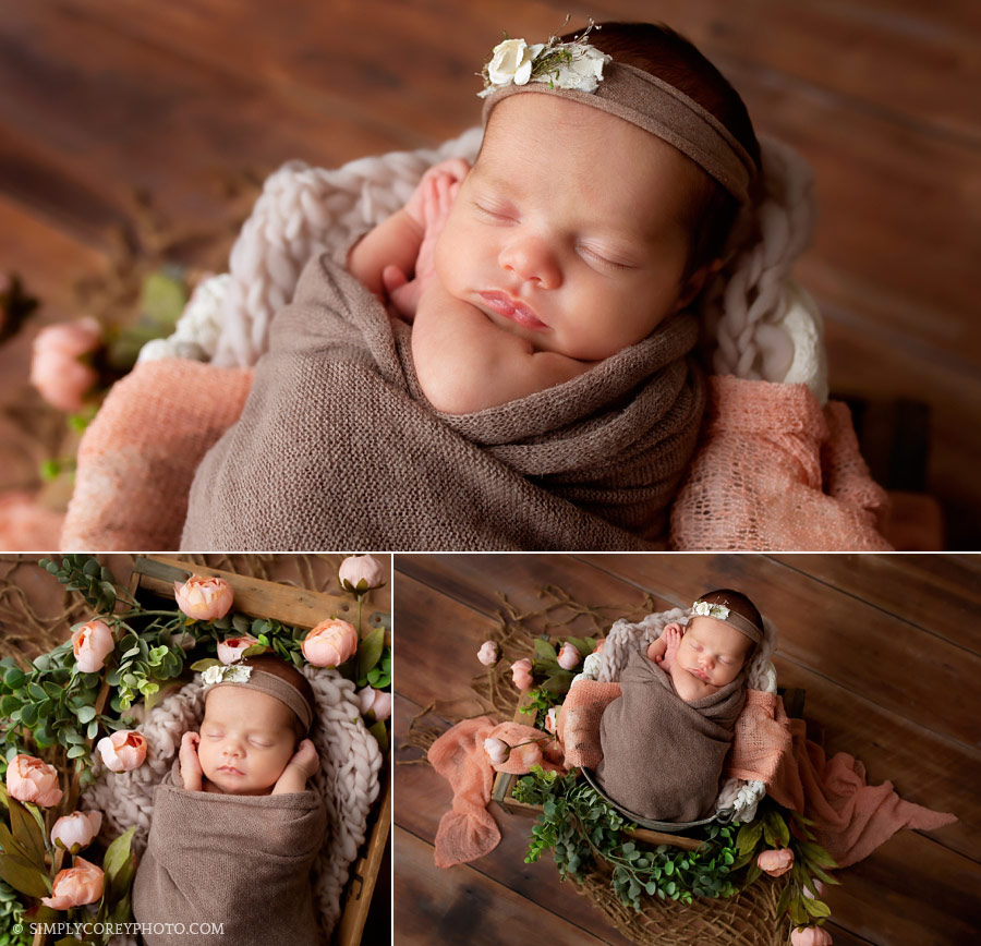 Newnan newborn photographer, baby girl with flowers and props in studio