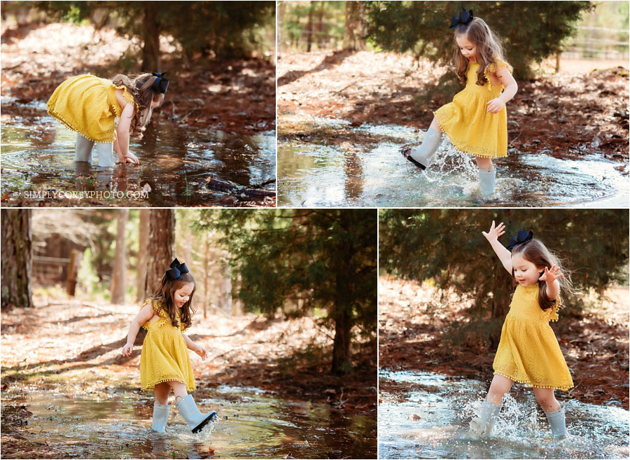 Douglasville lifestyle photographer, child playing in a large rain puddle