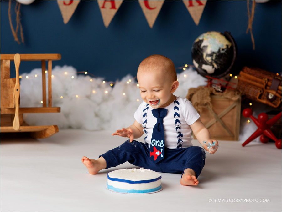 Carrollton cake smash photographer, baby boy laughing in studio